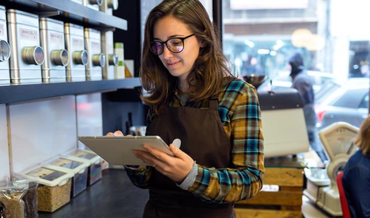 woman taking inventory